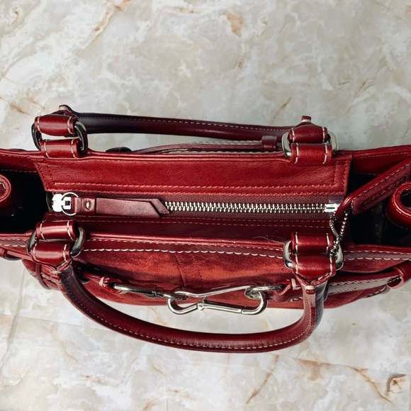 COACH dark red suede carry all with silver buckle. - Picture 6 of 11